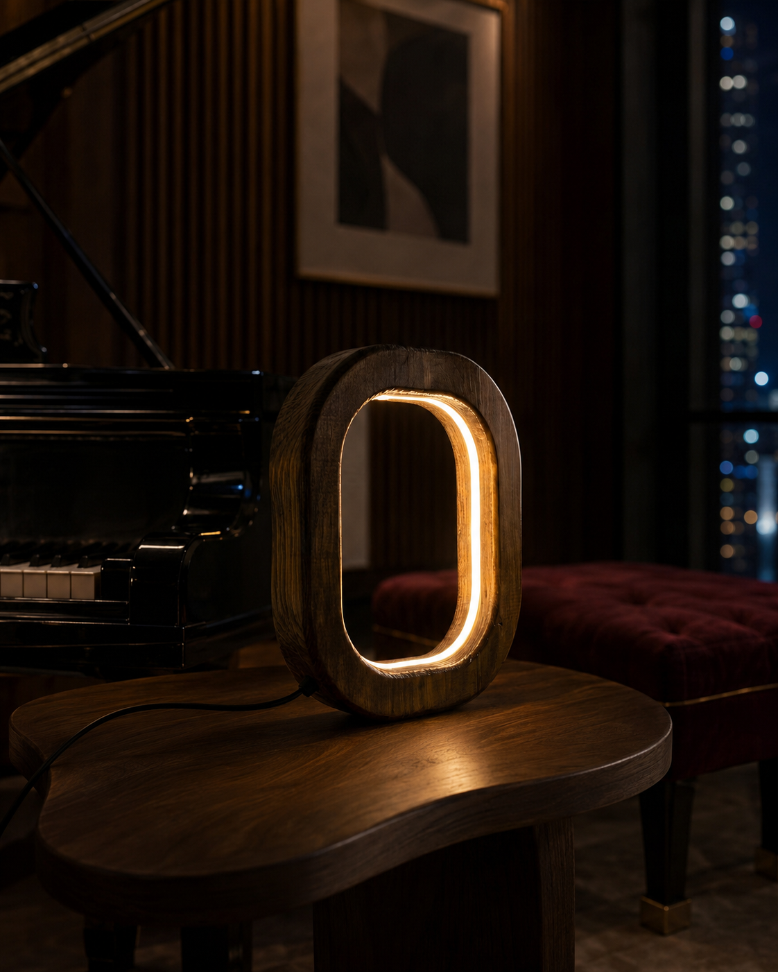 HaloFrame wooden LED lamp glowing on a walnut side table beside a grand piano at night